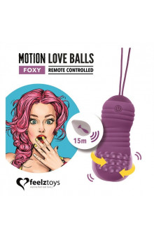 Фиолетовые вагинальные шарики с вращением бусин Remote Controlled Motion Love Balls Foxy